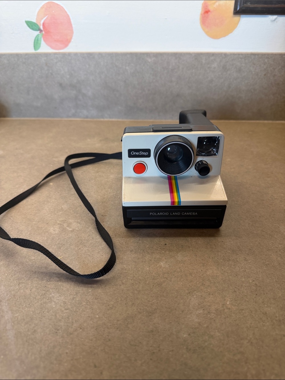 Polaroid White Instant Camera with Rainbow Stripe and Black Accents